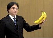 Iwata holding a bunch of bananas